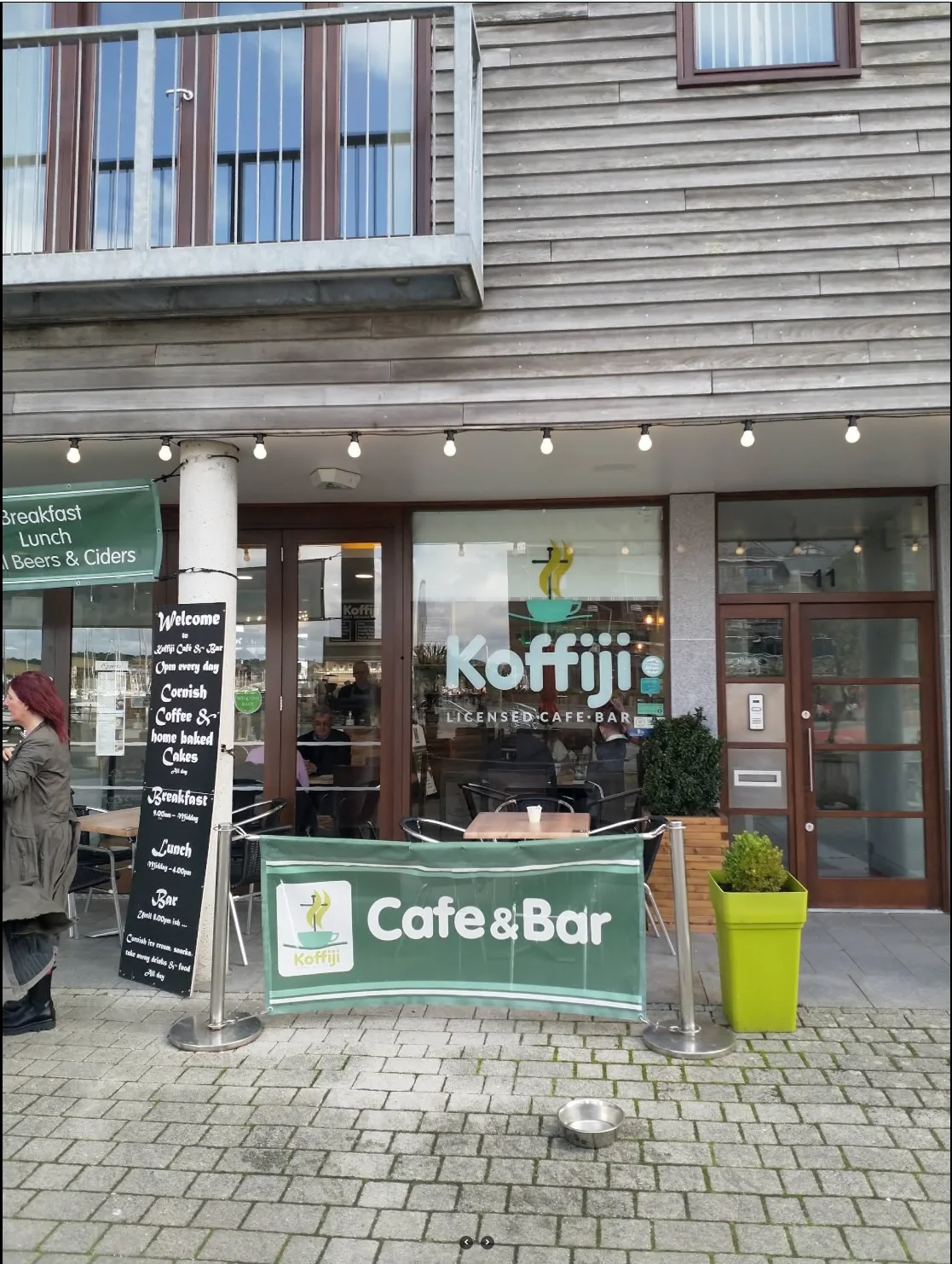 Koffiji entrance and outdoor cafe tables