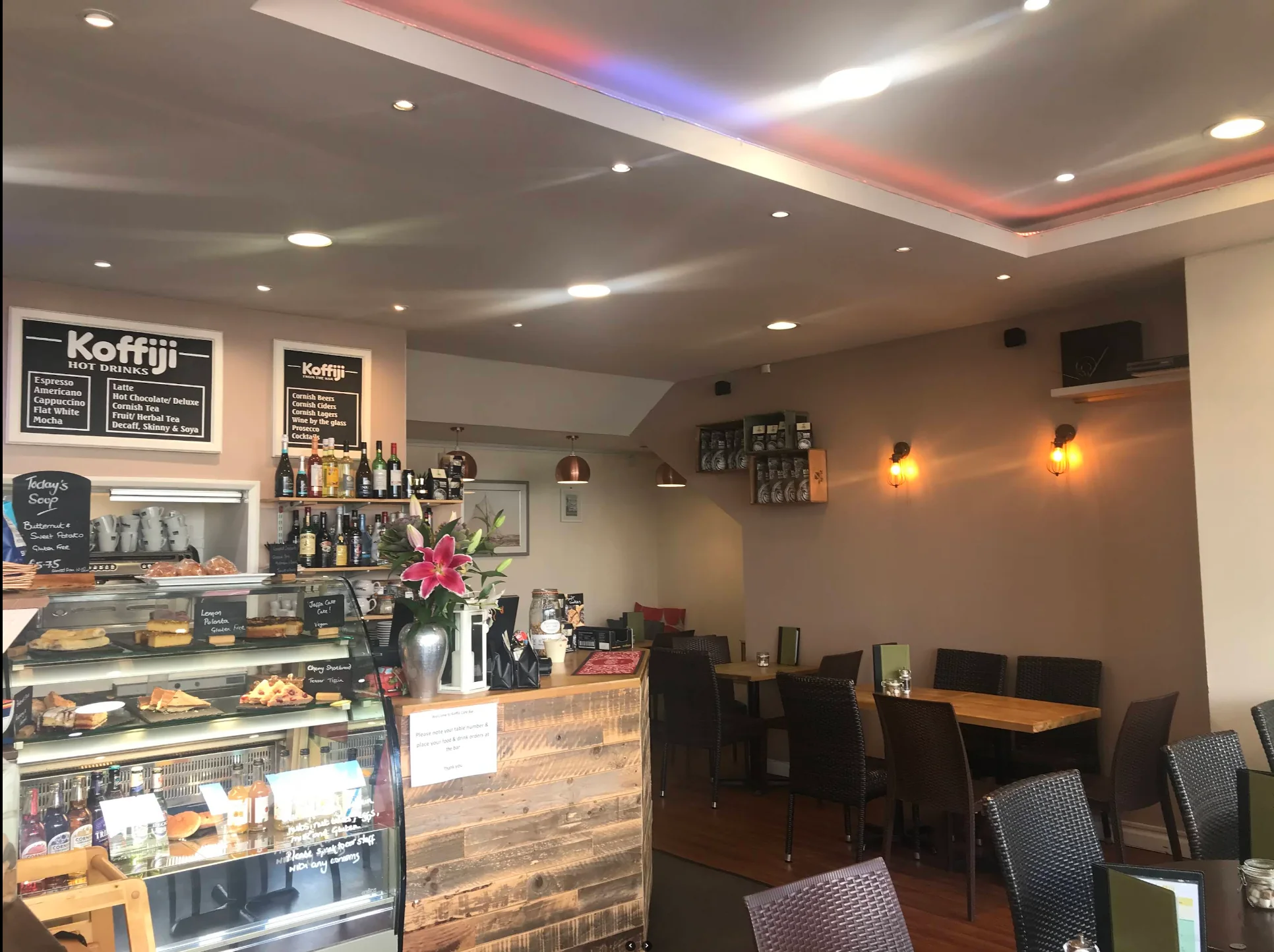 The warm and spacious interior of Koffiji Cafe and Bar